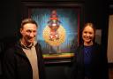 York City FC manager Stuart Maynard with artist Lucy Pittaway