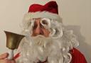 Santa gets his whiskers caught in his magic bell