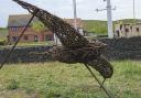 A new will sculpture of a swift at Dalton Park shopping centre