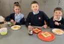 Families now have greater access to wraparound childcare provision before and after the school day. Pictured are pupils from Boroughbridge Primary School enjoying their breakfast.