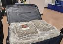 Case full of drugs seized by North East regional police agency in targeted arrest of suspected smuggler at airport in Liverpool