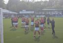Darlington's players celebrate after their Bank Holiday win over Radcliffe