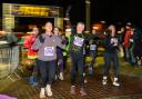 All smiles at the start of the 2025 HogmanHOWAY 5K