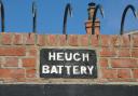 Sign marking Heugh Battery, the historic Hartlepool site where British guns fired back during a First World War attack.
