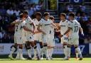 Middlesbrough players celebrate Will Lankshear's goal at QPR