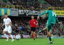 Northern Ireland’s Isaac Price attempts a shot on goal against Hungary (PA)