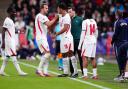 Harry Kane hands the captain’s armband to substitute Jude Bellingham during England’s win in Prague (Bradley Collyer/PA)