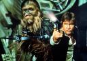 DON’T GET COCKY KID: Peter Mayhew as Chewbacca and Harrison Ford as Han Solo in Star Wars