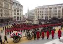 CEREMONIAL JOURNEY: The Union Flag draped coffin of Baroness Thatcher is carried on a gun carriage drawn by the King's Troop Royal Artillery during the procession to St Paul's Cathedral