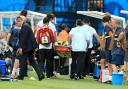 BAD LUCK: England physio Gary Lewin is stretchered off after dislocating his ankle celebrating Daniel Sturridge's goal against Italy Picture: Mike Egerton/PA Wire