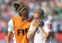 Emotional: England's Josanne Potter, left, consoles Laura Bassett after the team's 2-1 loss to Japan