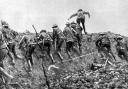 Soldiers go over the top at the Battle of the Somme into German gunfire