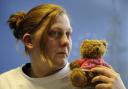 PLAN: Karen Matthews the mother of then missing 9-year-old Shannon Matthews holding her daughter’s favourite teddy bear