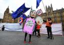A demonstrator dressed as Theresa May sells Brexit Fudge in Old Palace Yard, Westminster on Monday Picture: Kirsty O'Connor/PA