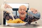 Richard Farley serving up fish and chips at the family shop Farley's in Horden, County Durham