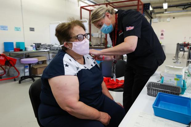 The Northern Echo: Susan Hansford receives her vaccine from paramedic, Louise Pugsley 