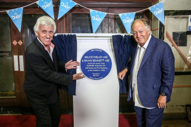 The Northern Echo: Summer Holiday writers Bruce Welch and Brian Bennett unveil a blue plaque at the Globe Theatre, Stockton. Picture: TOM BANKS.