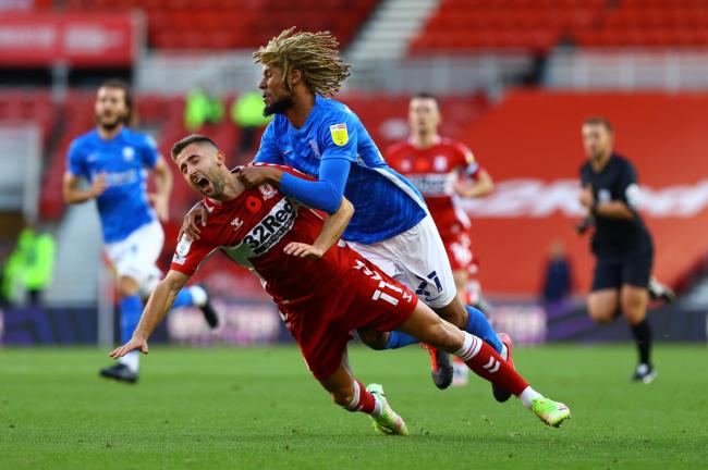 Andraz Sporar clashes with Dion Anderson during Boro's loss to Birmingham City.