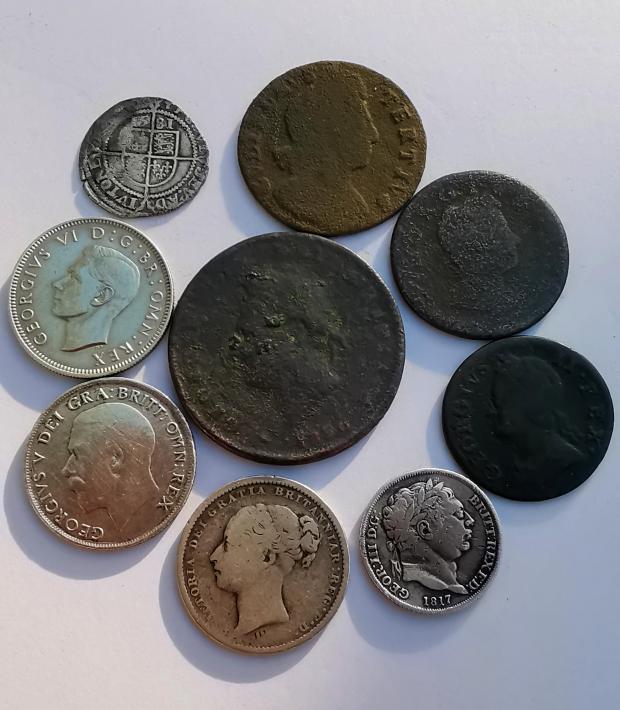 The Northern Echo: Mark has found more than 500 coins in the Dene Valley in recent weeks. These are some of the nicer ones starting with the Elizabeth I coin of 1581 top left: - Elizabeth 1st 1581- William 111 1696- George 1 1718- George 11 1754- George 111 1817- George IV