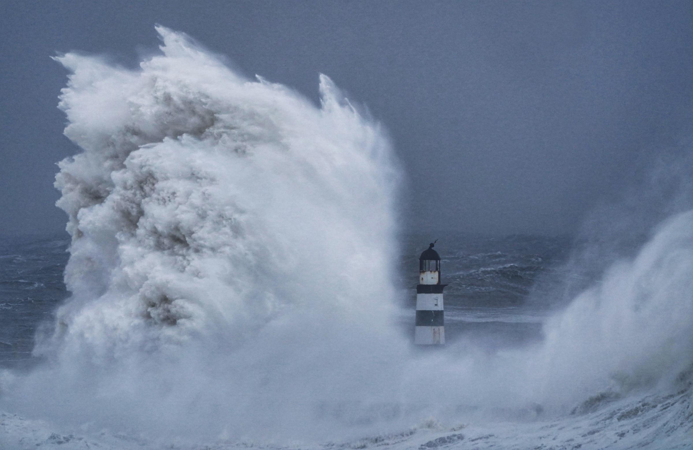 Huge waves crash against the lighthouse in Seaham Harbour, County Durham, in the tail end of Storm Arwen which saw gusts of almost 100 miles per hour battering areas of the UK. Picture date: Saturday November 27, 2021. PA Photo. The Met Office issued a