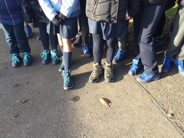 The Northern Echo: Pupils at St Benet's RC Primary School, at Ouston, County Durham, admire their new boots