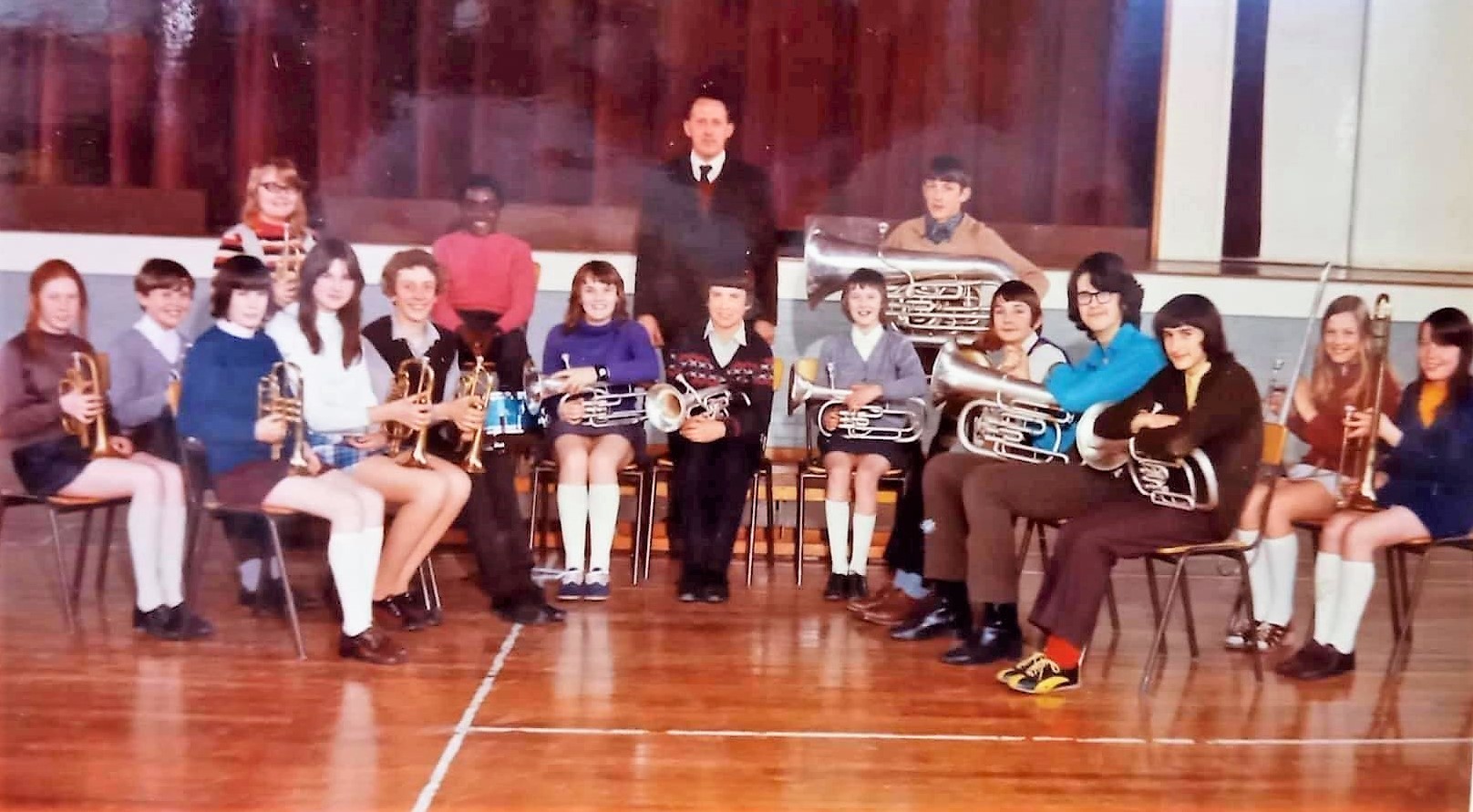 Janet (far right) in the school band with music teacher, Alf Liddle