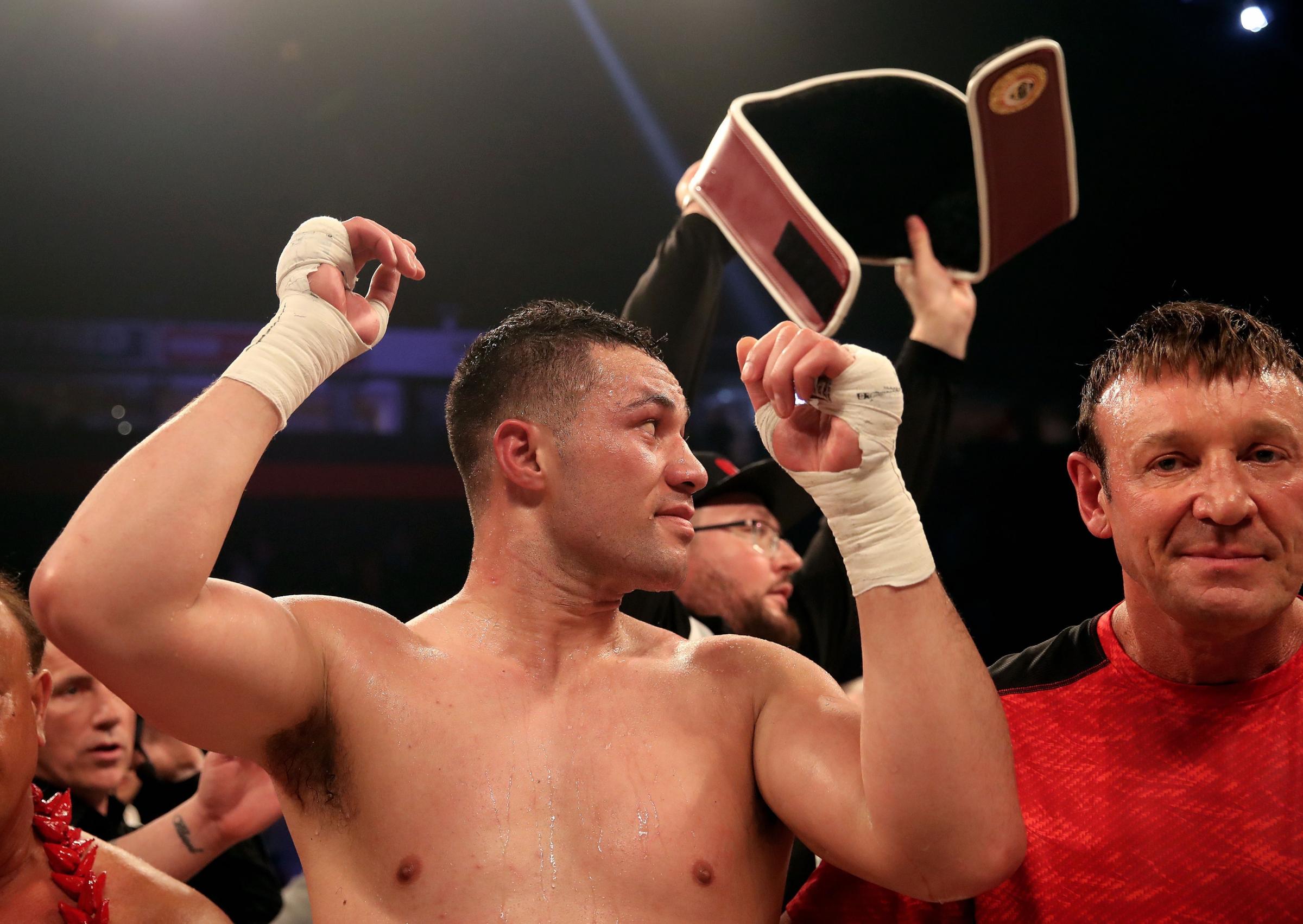 Joseph Parker celebrates victory over Hughie Fury as his belt his taken from him after the WBO World Heavyweight Title bout at Manchester Arena. PRESS ASSOCIATION Photo. Picture date: Saturday September 23, 2017. See PA story BOXING Manchester. Photo