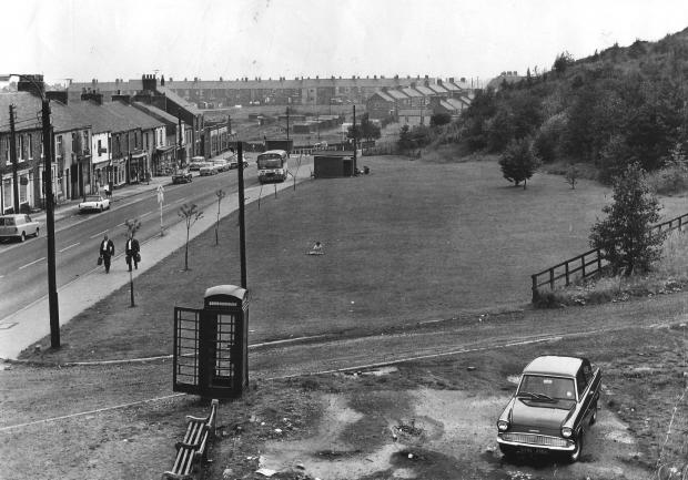 The Northern Echo: Taken from the level crossing signalbox beside the Dovecote Inn looking south down Salters Lane in August 1969. Cooks Terrace on the left has yet to be cleared but the grassy area in front of the cameraman was the site of Lane Row, a terrace of