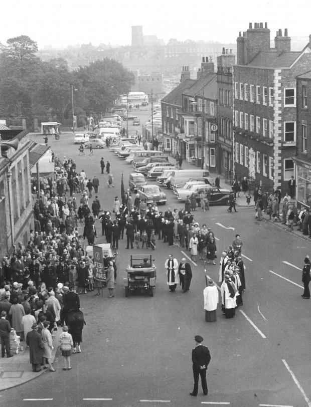 The Northern Echo: The view from Binns' upper floor looking straight down Horsemarket and Leadyard to the River Skerne - the new town hall of 1970 blocks out the bottom part of this view. What is the occasion? There's clearly a religious procession into the old