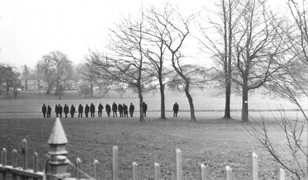 The Northern Echo: A herd of policemen, like wildebeests, sweeps majestically across the plain of South Park in Darlington, opposite Blackwell Grange, in search of clues in January 1976 following a stabbing