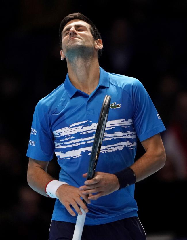 File photo dated 12-11-2019 of Novak Djokovic reacts. Australian Open organisers still do not know whether defending champion Novak Djokovic will play in next month's tournament. Issue date: Wednesday December 22, 2021. PA Photo. See PA story TENNIS