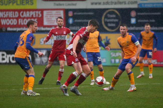 Boro players in action against Mansfield.