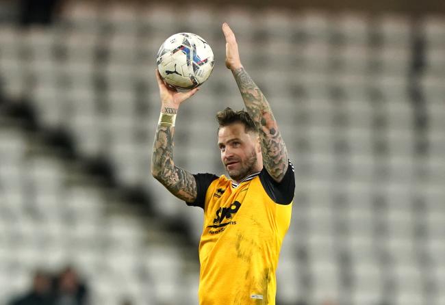 Former Black Cats striker Chris Maguire celebrates with the match ball after scoring a hat-trick in Lincoln City's 3-1 win over Sunderland at the Stadium of Light last night