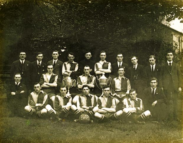 The Northern Echo: Bishop Auckland FC in 1922 after winning the FA Amateur Cup for a second successive season. George Mullen, who scored a crucial goal in the final, is second from the right on the front row