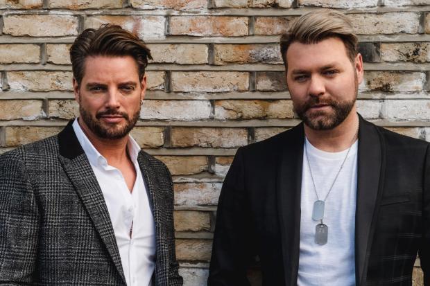 Keith Duffy and Brian McFadden of Boyzlife  (PA)