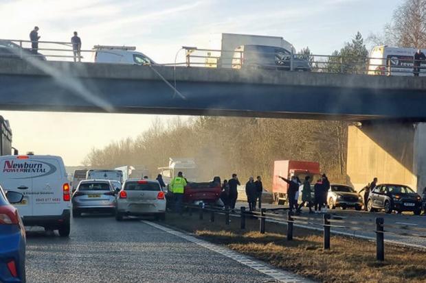 The Northern Echo: The aftermath of the A1(M) crash that saw a car smash through the barriers of the A177 flyover and on to the A-road below. Picture: PA MEDIA.