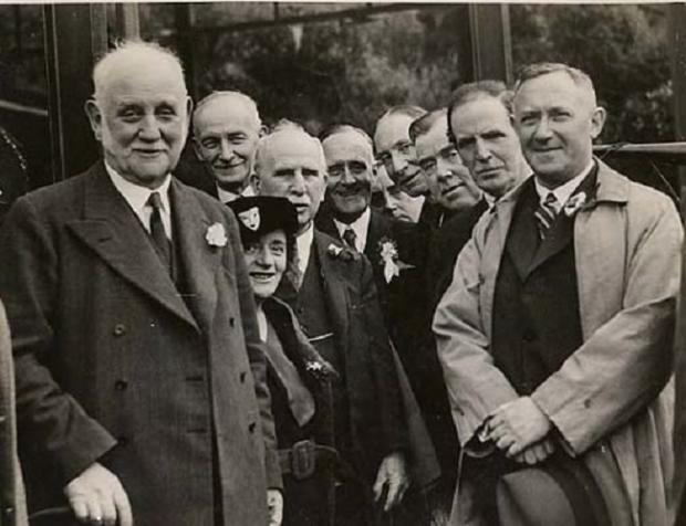 The Northern Echo: County Durham MPs after the May 1929 featuring diminutive Ellen Wilkinson, MP for Middlesbrough East. Newly-elected Hugh Dalton, Ruth's husband, is towering behind her