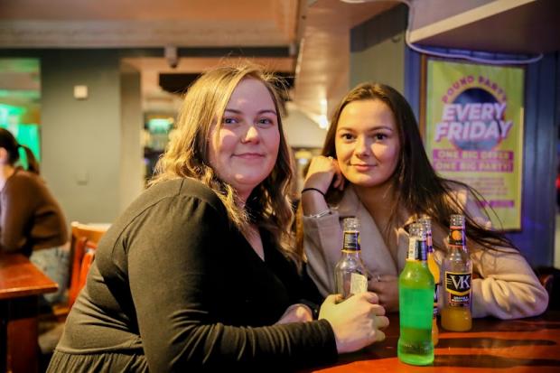 The Northern Echo: Sisters Kathryn Bellamy, 24, and Ellie Robinson, 18, were on a night in the town. Picture: SARAH CALDECOTT