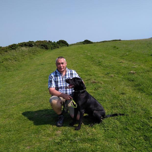 The Northern Echo: Rob Tocher, from Ferryhill, with his PTSD assistance dog. Picture: Handout