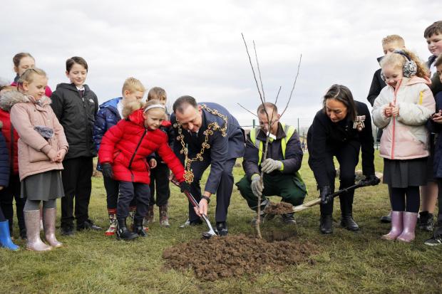 The Northern Echo: The Mayor of Stockton-on-Tees, Councillor Kevin Faulks, with the Lord-Lieutenant of North Yorkshire and schoolchildren from Barley Fields Primary School, Ingleby Barwick, ‘Plant a Tree for the Jubilee’ as part of The Queen’s Green Canopy. Picture: STOCKTON BOROUGH COUNCIL