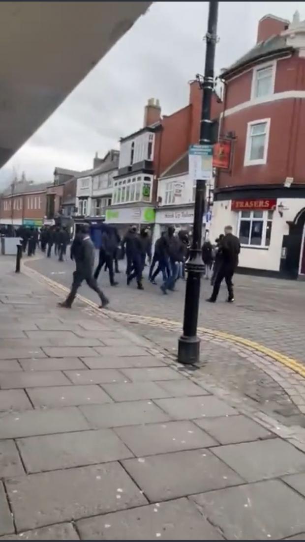 The Northern Echo: Fighting erupted in Darlington town centre between rival football fans. Picture: Twitter.