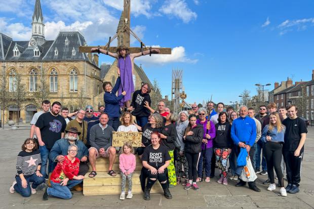 The Northern Echo: Jesus (Paul Taphouse) rehearses the crucifixion in Bishop Auckland Market Place with Rev Canon Eileen Harrop (L), Performance Director Sam Bradshaw (C), Rachael Masters (R) and members of cast and crew..
