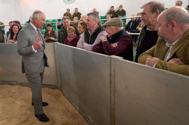 The Northern Echo: The Prince of Wales meets farmers as he opens the Darlington Farmers Auction Mart. Picture: PA
