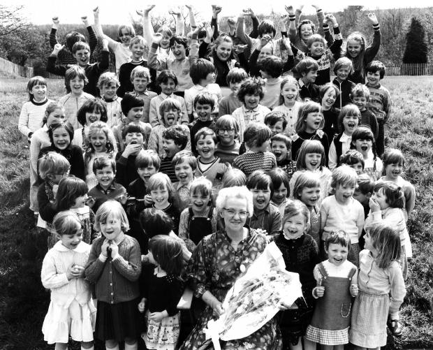 The Northern Echo: Ebchester Junior School marked the end of caretaker Louisa Robinson's 18 years at the school in July 1983 by presenting her with a bunch of flowers