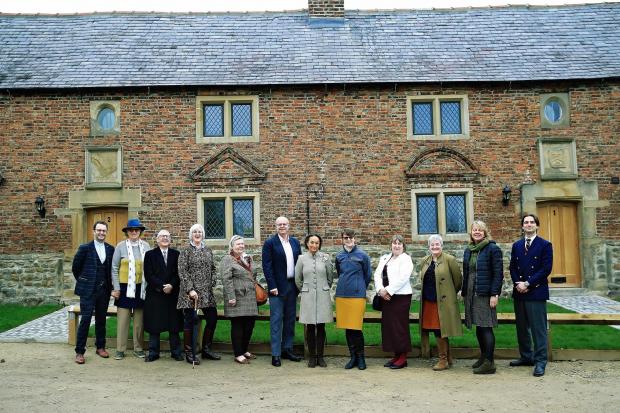 Lord Lieutenant for North Yorkshire, Johanna Ropner, centre in grey, with Broadacres’ Chief Executive Gail Teasdale (yellow skirt) along representatives of The Matthew Robinson Trust and other partners