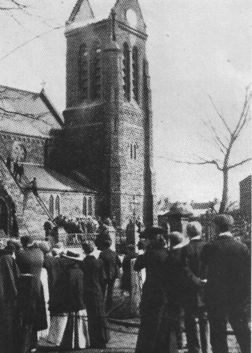 The Northern Echo: The congregation watches as ladders are placed against the tower of St Mark\'s Church, Marske-by-the-Sea