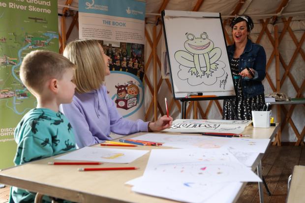 The Northern Echo: Local artist, Liz Millions, led drawing workshops in Hardwick Park's yurt. Picture: Chris Booth