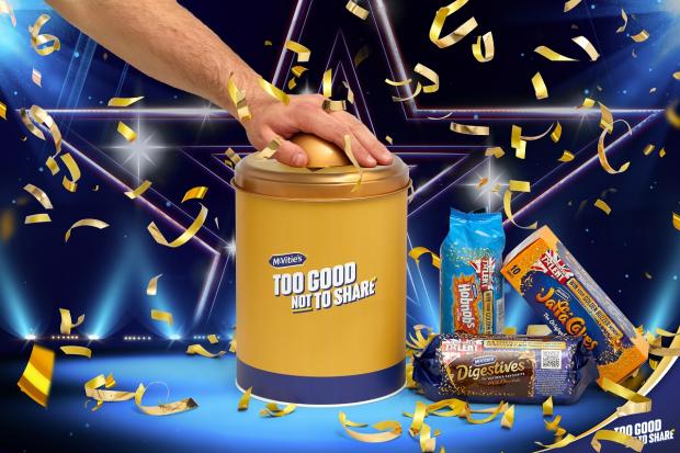 The Northern Echo: McVitie’s Britain’s Got Talent Golden Buzzer Biscuit Tins come stuffed with promotional packs of sweet treats. Picture: Taylor Herring