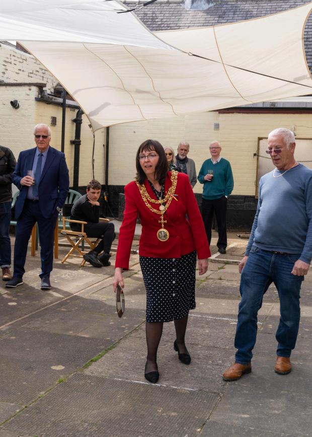 The Northern Echo: Darlington mayor Cyndi Hughes has a go at quoits. Picture: Steven Curtis