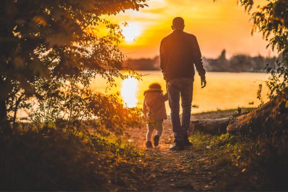 The Northern Echo: Father and child walking together at sunset. Credit: Canva The Northern Echo: Father and child walking together at sunset. Credit: Canva